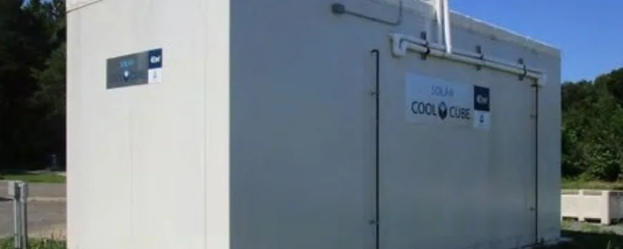A DGrid Energy solar cold-chain Cool Cube unit installed outdoors.